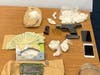 Four people in the city and town of Poughkeepsie were accused of having illegal drugs and weapons.
