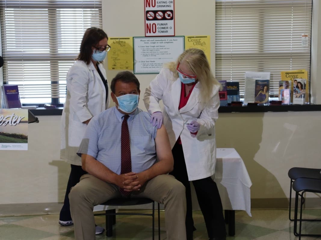 Westchester County Executive George Latimer, center, receive his annual flu show Thursday from county health commissioner Dr. Sherlita Amler.