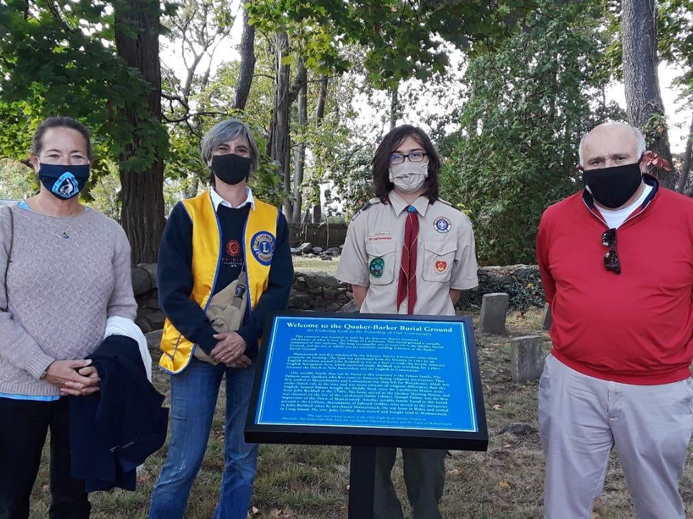 From left, Mamaroneck Town Supervisor Nancy Seligson, LM Lion Diane Oldham, Yuji Kono and Town Administrator Steve Altieri at a plaque and bench dedication at the Quaker-Barker Cemetery​.