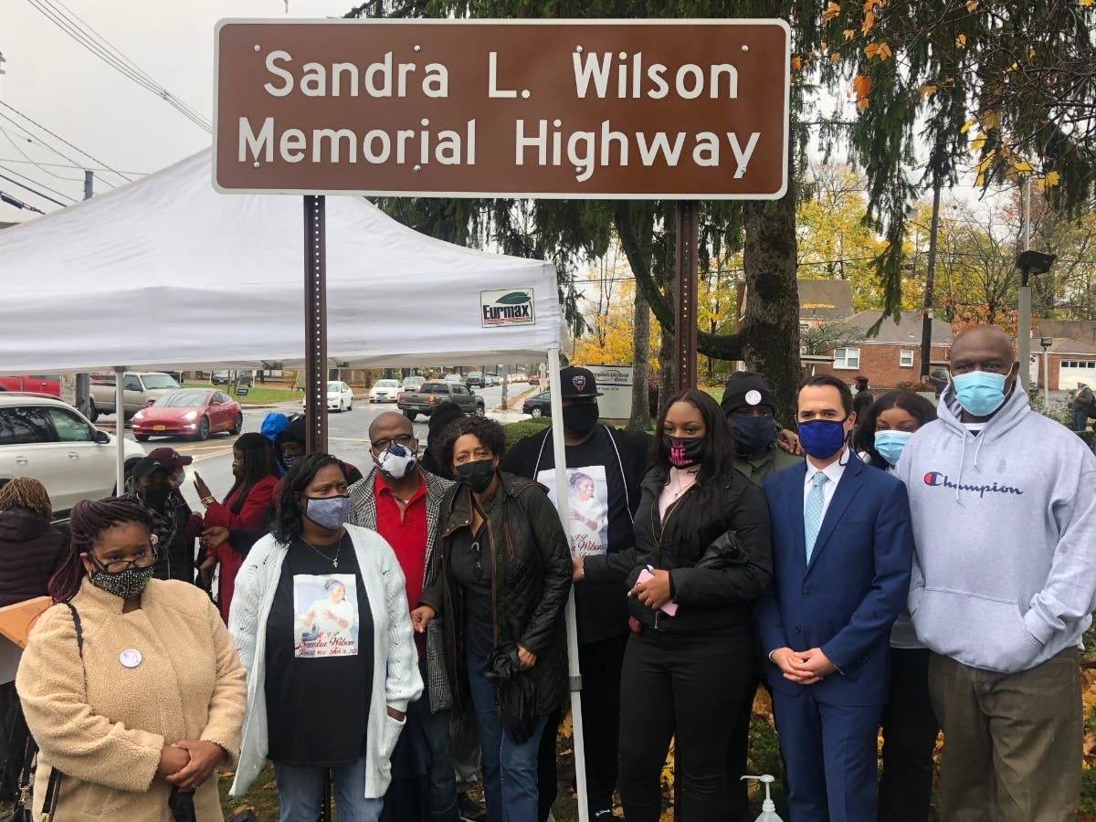 Sandra Wilson, the security guard who was stabbed to death in February at the Finkelstein Memorial Library in Spring Valley, had a portion of a highway named after her Friday.