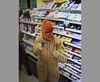 A Hyde Park man was accused of robbing a service station at gunpoint two years ago.