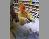 A Hyde Park man was accused of robbing a service station at gunpoint two years ago.