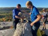 Liza, center, a 12-year-old dog, was rescued from a narrow crevice in Minnewaska State Park Preserve Tuesday after five days without food or water.