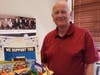 LincolnWay Community Bank president Mark Stevens prepares to deliver gift baskets to New Lenox police department.