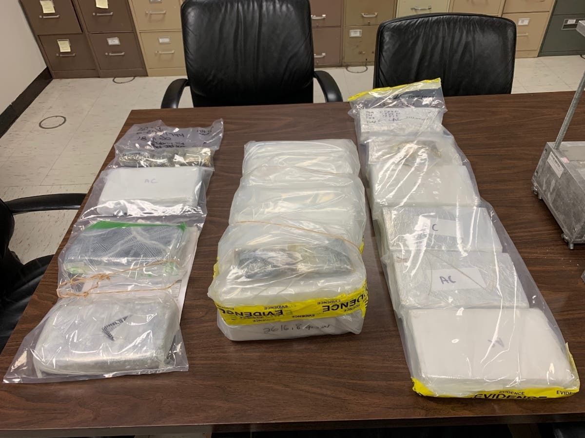 Nineteen kilograms of narcotics, as well as $1.5 million in cash, were seized, prosecutors said.