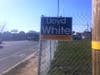 Sign on Fence