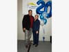 Mark A. Collins, Trustee, Niles Township Government celebrates with Rifath Khan, CEO for The Douglas Center