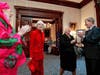 Carol Channing, center and Republicans Susan Emerson (left) and Fran Wendelboe (right) greet Democratic Governor John Lynch, after they performed for him. 