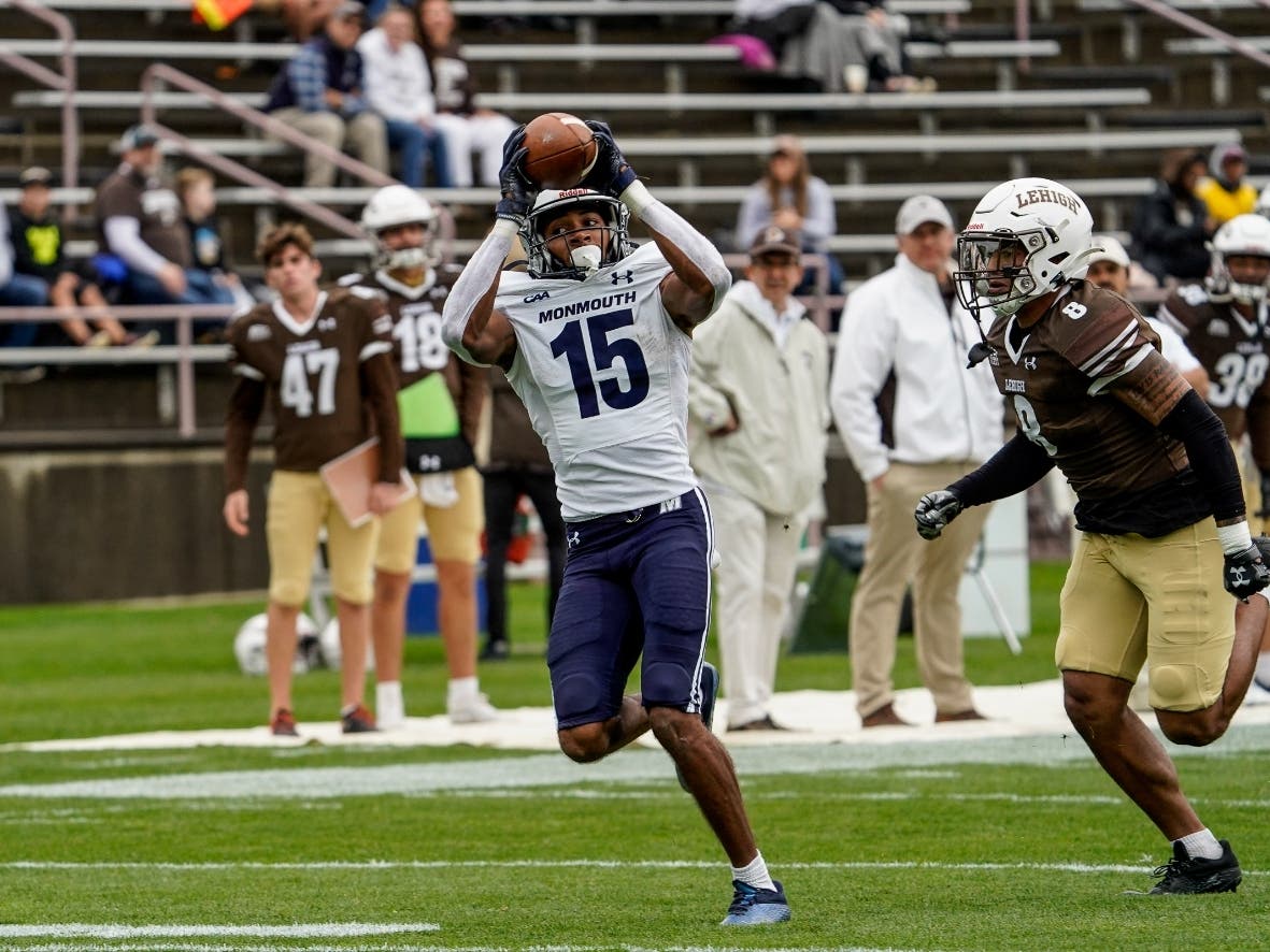 #15 Dymere Miller hauling in one of his nine receptions for TD