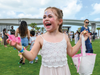 Joy is on the face of this young lady, who found a golden egg inside one of the Easter eggs she found at the Clearwater Community Volunteers 29th annual Ginormous Easter Egg Hunt in Clearwater’s Coachman Park.