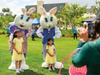 Young guests spend a little time with the Easter Bunny and Mrs. Bunny before the official hunt starts at the 29th Annual Ginormous Easter Egg Hunt, produced by the Clearwater Community Volunteers and sponsored by the Church of Scientology.

