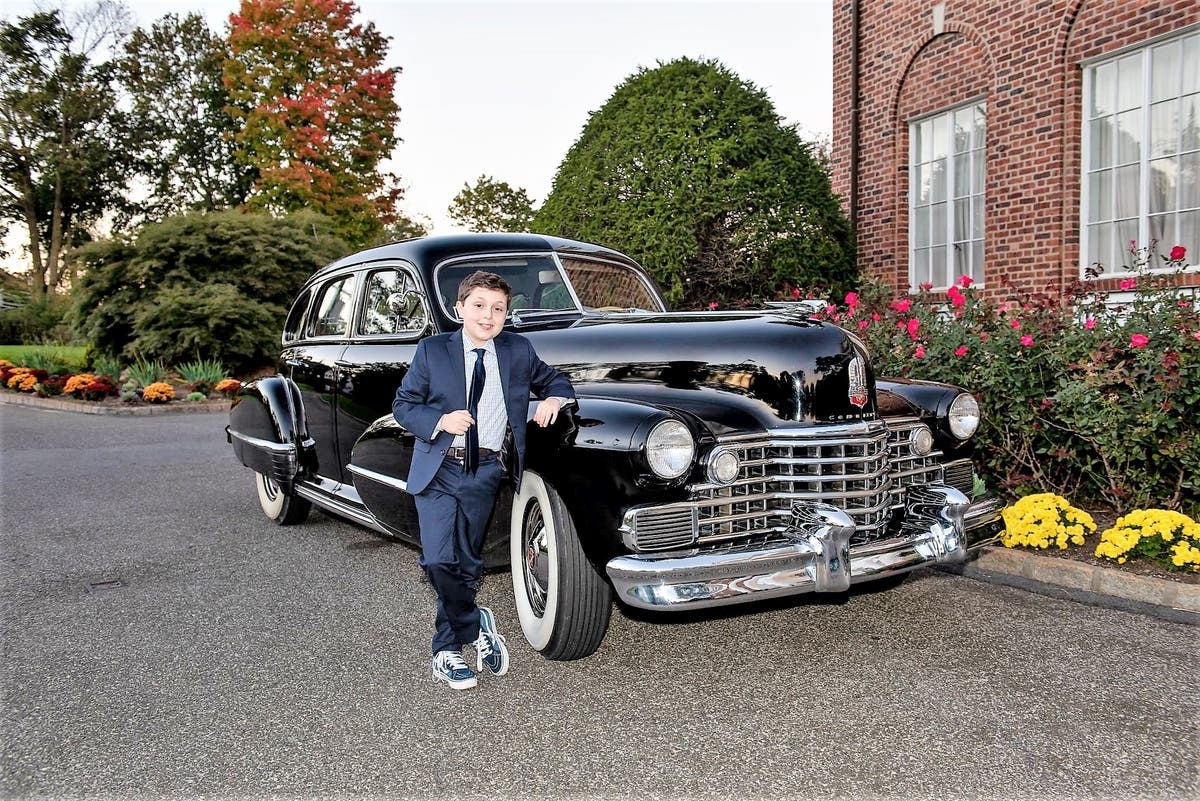 https://patch.com/img/cdn20/users/63182/20181024/105040/styles/raw/public/processed_images/jordan_cole_with_1942_cadillac-1540390384-1820.jpg