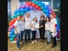 Team We Showed Up --  Sandy Capuano, Sue Porcelli, Jeffrey Endervelt, Elena Demos and Liz Fried -- accept their prize from Karel Littman, Executive Director of the New Rochelle Business Improvement District (BID) and NRPLF President Chris Selin.