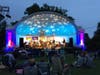 Live music at the Hudson Park Band Shell after dark