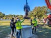 A team from ASF Construction & Excavation worked with sculptor Derek Chalfant to hoist the statue into place.