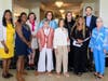 NRCCS Vice President Lisa Burton (left) and President Karenann Carty (right) posed with representatives of the four Micro Grant winners, the New Rochelle Council on the Arts, Songcatchers, Phoenix Village and Trifecta Steppers & Company. 