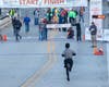 Jack Jennings, 13, from Palatine, approaches the finish line of the Healthy Driven Naperville Half Marathon & 5K on Oct. 17. Jennings was the overall winner of the 5K with a time of 19:02.