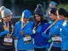(From left) Jaimini Patel, Nila Patel, Jaymin Patel, Alka Patel and Shital Patel, all of Plainfield, admire their medals after completing the Healthy Driven Naperville 5K on Oct. 17.