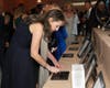 Lisa Gutierrez, a Hinsdale resident, enters a bid during the silent auction at the Elmhurst Memorial Hospital Foundation’s 18th Annual Autumn Affair, Sept. 10 at the Four Seasons Hotel Chicago in Chicago.
