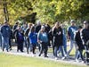 More than 1,100 people took part in SHARE’s 16th Annual “A Walk to Remember” on Oct. 15 in downtown Naperville, including Stefanie and Marc Bloemers of Romeoville.