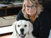 Villa Park Community F.U.N. (Focus on Unifying Neighbors) Commission chairperson Leslie Allison-Seei, with one of her dogs, Bentley, a European Crème Golden Retriever. Bentley will be getting married at the September 25th dog wedding ceremony.