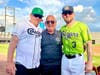 Dr. Bob Froehlich, Cougars owner and CEO,  is flanked by Cougars All-Star Jimmy Kerrigan (right) and Kerrigan's father at the AAPB All-Star Game recently. Of the world record attempt, Froehlich said, "Our organization was made for this event."