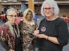 Gail Zelitzky (left) and Catherine Marienau (right) chat with Celebrating Seniors honoree Margaret Nafiseh after their presentation. During the luncheon, Nafiseh was among several women who emerged as prospective guests on their podcast.