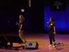 The founders of SafeStride Robotics LLC, Rudy Ruelas II (left) and Han Ju speak from the DePaul stage. They are developing a robotic guide dog designed to help the visually impaired navigate their environments more safely and independently.