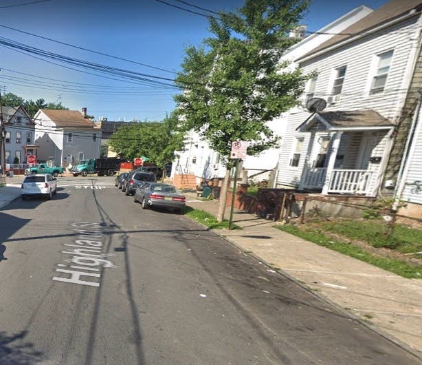 Heroin, cocaine and guns were found in four busts, cops say, one of which took place on this street.. 