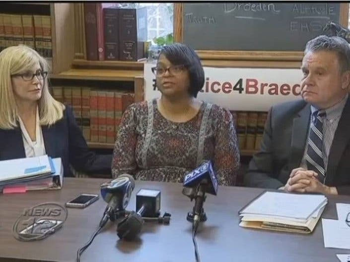 Braeden's mother, Joanne Atkins-Ingrams, with her lawyer, Jill Greene, and Rep. Chris Smith.