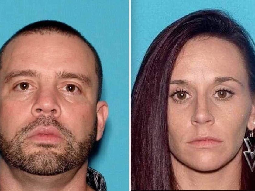 Police say the armed-and-dangerous couple had explosives.