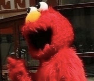 The Elmo impersonator was posing for a photo with the girl's family, police said.