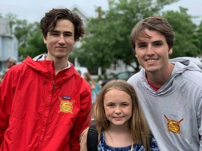 Sam Jarmer, left, and his siblings Michael, right, and sister, Molly.