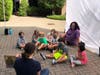 Pictured enjoying storytime with their class pod,  led by K-ready teachers Meredith Cherna and Rachel Breitman are Early School students. 