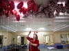 Amy Odell untangles Valentine balloons at Times of Shorewood. Residents received a special Valentine’s Day surprise from families of residents, Timbers’ neighbors and local businesses. 