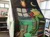 Close up of the mural painted on the canvas tent centerpiece for the Anza Valley Community Library's Summer Reading Program.