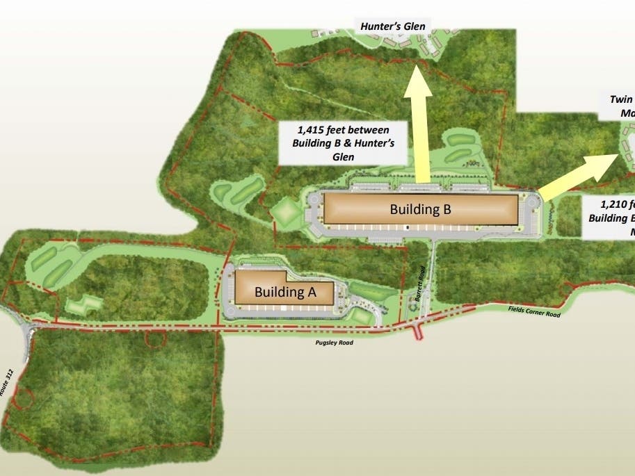 A warehouse development project proposed for Southeast has been scaled back to two buildings from four.