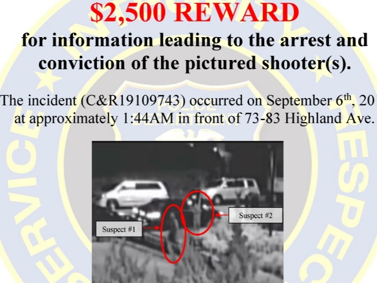 Two shooters fired at a group of young people outside a building and then fled, police said. A 12-year-old was hit.