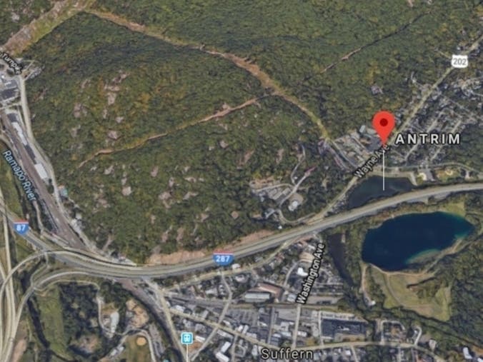 Lake Antrim is bordered by Route 202 to the northwest and I-87 to the south.