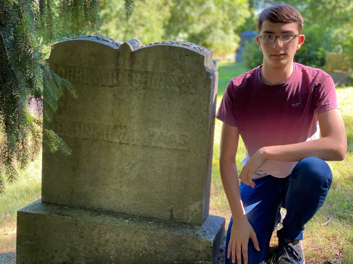 In pursuit of recording Black history, Putnam County PILOT Intern Andrew DiFabbio visits Orrin Hutchinson's grave at the Old Methodist Cemetery in Brewster, New York. 