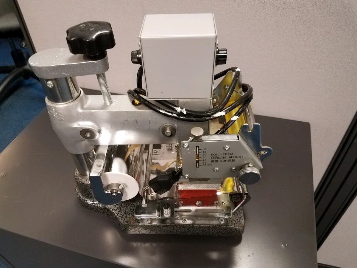 A machine for making forged passport cards was found in a Mount Vernon home.