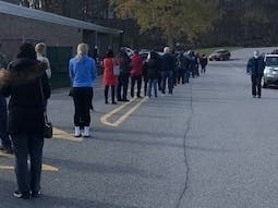 Voters stayed socially distanced outside a polling place in Putnam County Nov. 3, 2020.