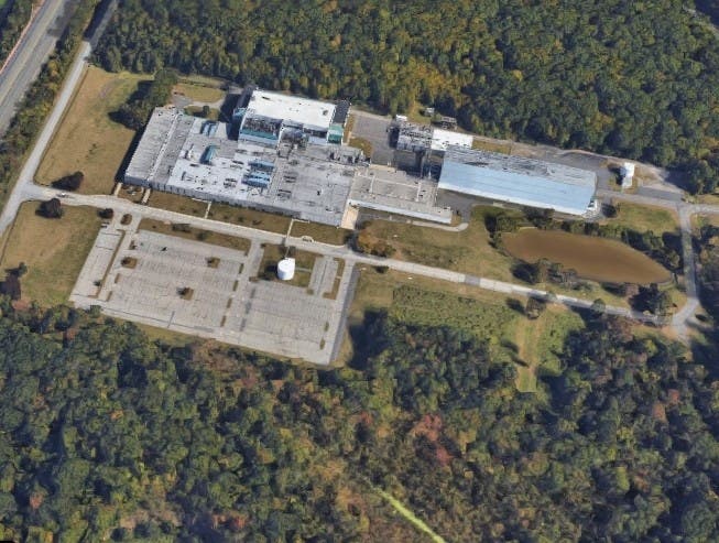 The former Novartis plant is up for sale again but there are wrinkles. 
