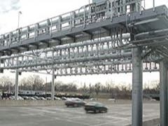 A cashless toll gantry records E-ZPass and license plate numbers on the New York State Thruway.