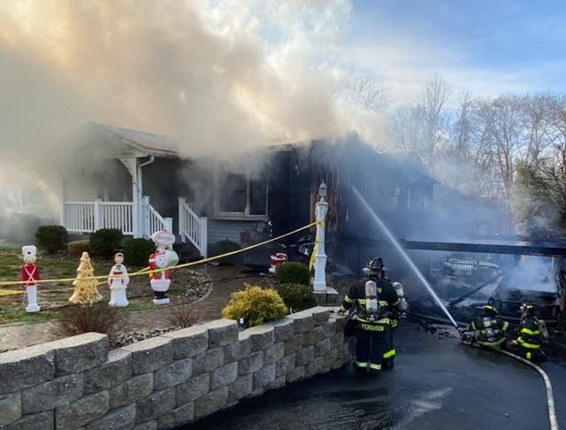 Firefighters from several departments battled a house blaze Dec. 15, 2020.