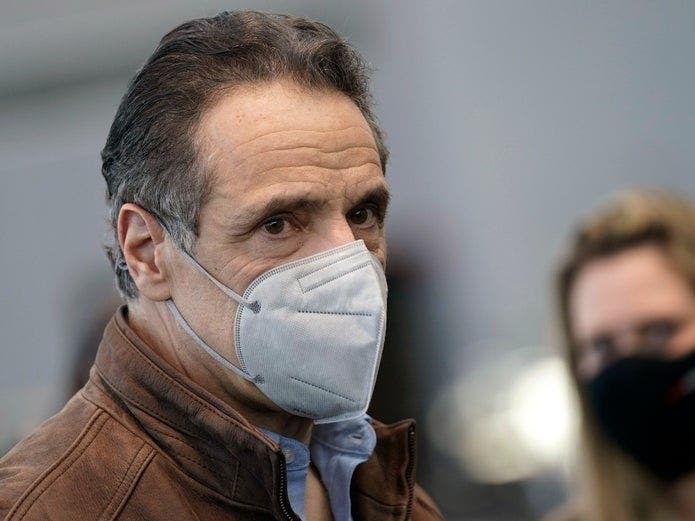 New York Gov. Andrew Cuomo greets people after speaking at a vaccination site at the Jacob K. Javits Convention Center on March 8, 2021 in New York City.