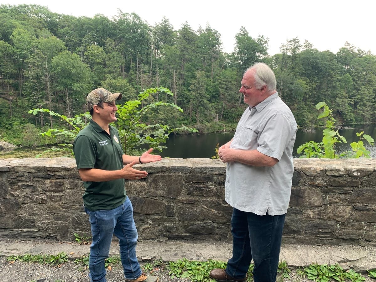 During a constituents' walk, Assemblyman Kevin Byrne and Putnam County Legislator William Gouldman discussed state and local issues in Putnam Valley at Pelton Pond in Fahnestock State Park.
