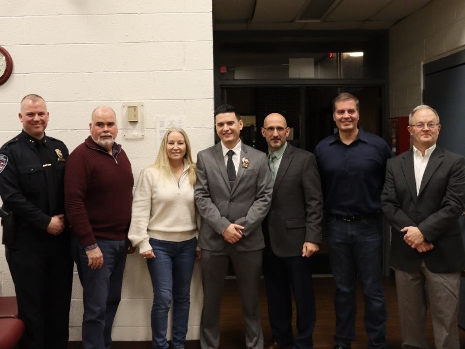 Marking the promotion of Daniel Shea to police detective in Carmel were, from left: Chief Tony Hoffmann, Councilman Bob Schanil, Councilwoman Suzi McDonough, Det. Shea, Supervisor Mike Cazzari, Councilman Frank Lombardi, & Councilman Stephen Baranowski.
