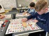 Fourth graders at Fulmar Road made Jacob's Ladders, a colonial-era toy, as part of a special lesson from the BOCES Center for Environmental Education.