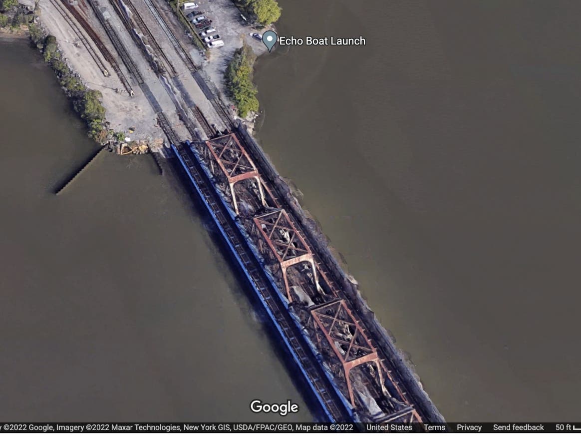 A woman drove into the Hudson River at the mouth of the Croton River near the MTA trestle bridge, police said.